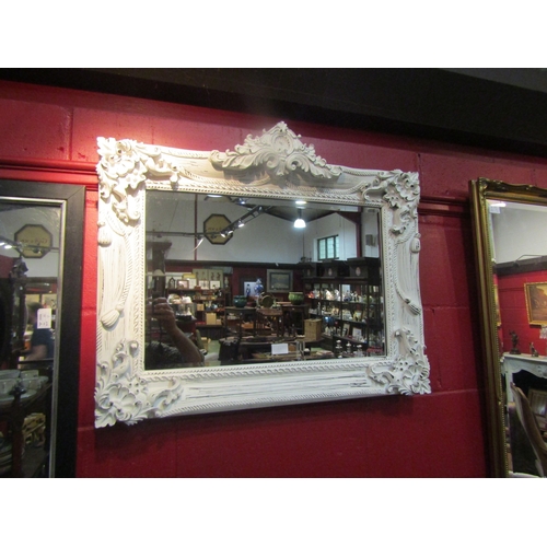 4135 - A modern French style white painted classical wall mirror with bevelled glass, 64cm x 76cm