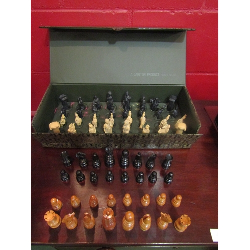 4136 - A box of chess pieces to include 