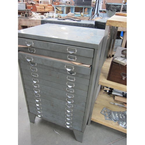 2027 - A metal filing cabinet of 15 drawers containing veneers