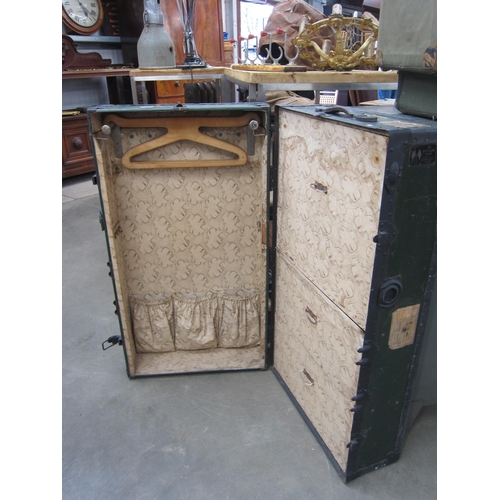 2029 - An early 20th Century steamer trunk, fitted wardrobe interior, some travel provenance labels