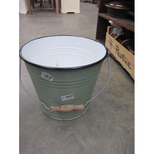 2050 - A green enamel bucket   (R)