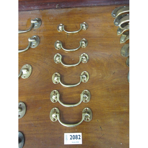 2082 - Six small brass swan neck handles