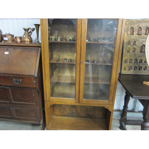 2108 - A Georgian golden oak display cabinet