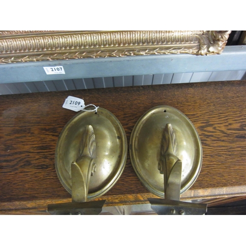 2109 - A pair of Edwardian brass wall sconces