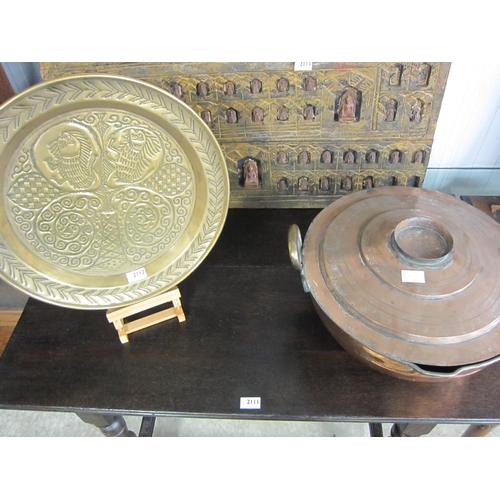 2112 - An embossed large brass dish together with a copper Turkish steamer