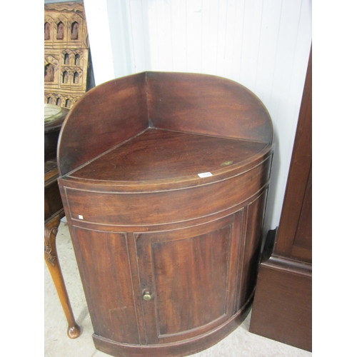 2120 - A Georgian mahogany campaign corner cupboard