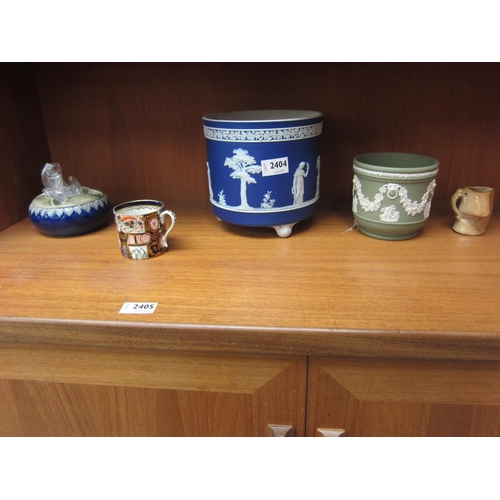 2404 - A Wedgwood blue Jasperware jardiniere and a similar green pot etc.