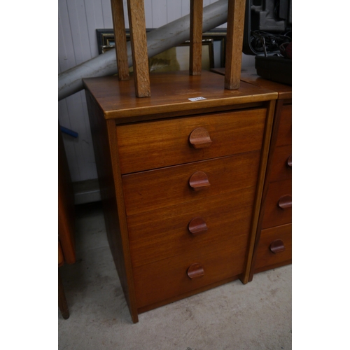 2414 - A 1970's teak Stag chest of four drawers