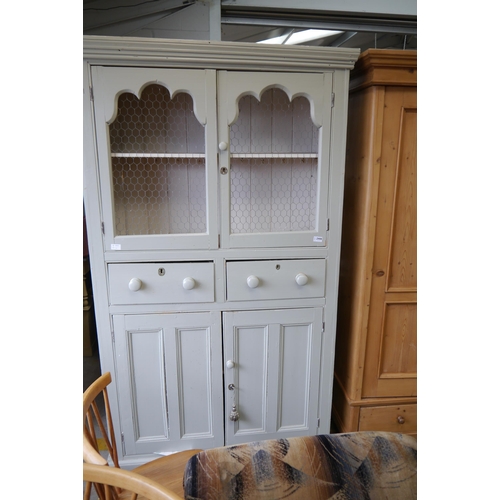 2444 - A 19th Century grey painted kitchen cupboard, twin meshed doors over two drawers and two door cupboa... 