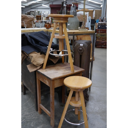 2013A - An oak school desk and two height adjustable stools