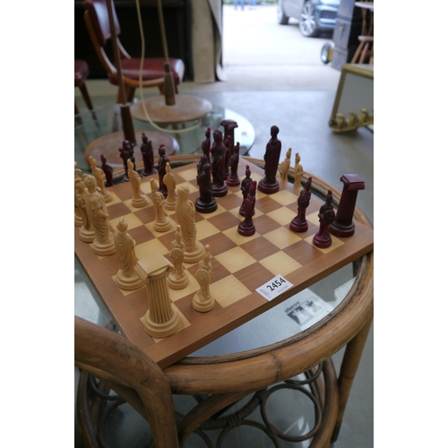 2454 - A resin chess set and board  (R) £0