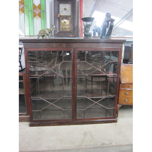 2128 - A Georgian mahogany astragal glazed bookcase