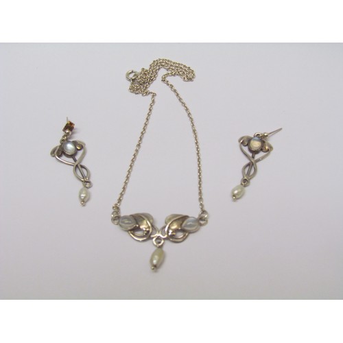 1105 - A silver Art Nouveau style modern necklace set with moonstone and hung with a freshwater pearl drop,... 