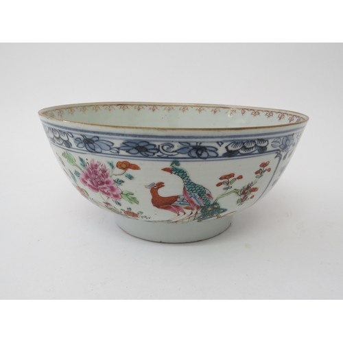 6028 - An 18th Century Oriental export bowl, hairline crack to side, 9cm tall x 20cm diameter