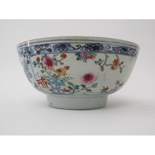 6028 - An 18th Century Oriental export bowl, hairline crack to side, 9cm tall x 20cm diameter