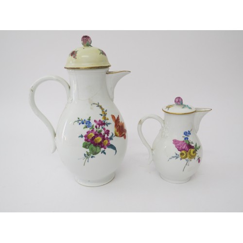 6050 - Two Meissen lidded jugs, cracks present to large example and restoration, 15cm and 26cm tall