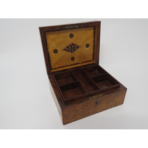 6104 - A Walnut jewellery box with compartmented tray interior and parquetry inlay, 10cm x 21.5cm x 17cm