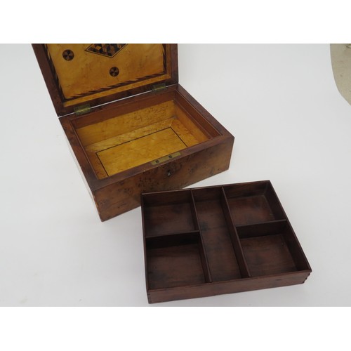 6104 - A Walnut jewellery box with compartmented tray interior and parquetry inlay, 10cm x 21.5cm x 17cm