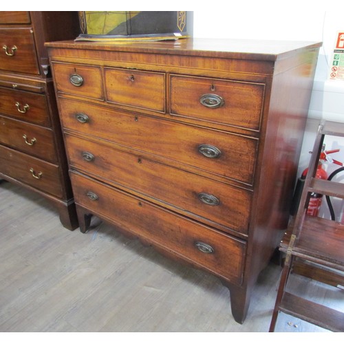 6080 - A Georgian three over three chest of drawers with oval plate handles, some beading missing, 115.5cm ... 