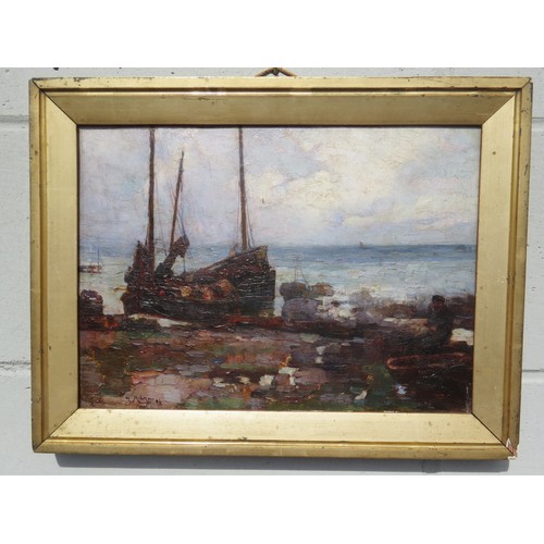 6088 - WILLIAM WATT MILNE ( 1865-1949) An oil on canvas, moored boats on beach with fisherman mending the n... 