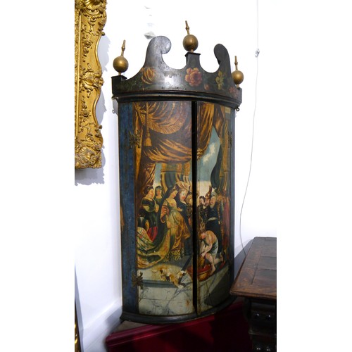 6069 - A painted Georgian corner cupboard, the doors painted with Regal figures and decapitated head, 122cm... 