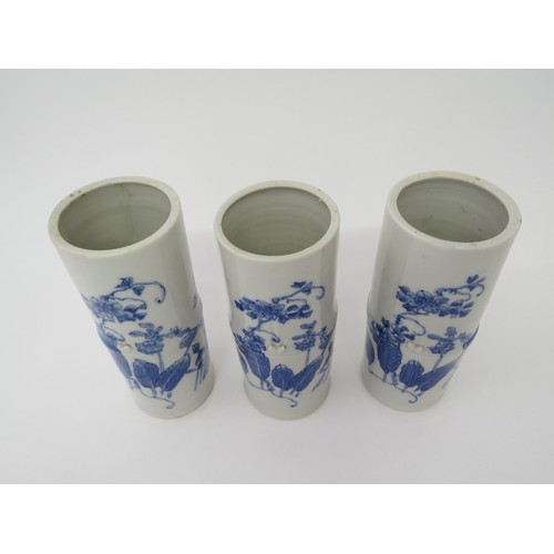 6027A - Three Japanese porcelain brush water pots of bamboo design, 19.5cm tall