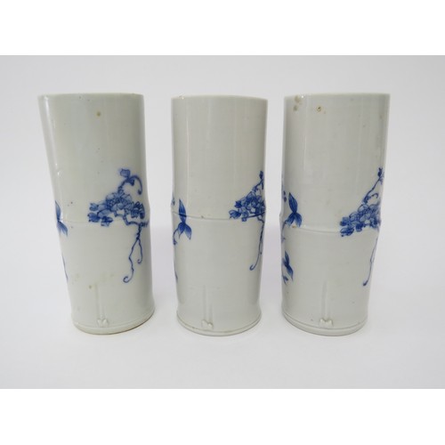 6027A - Three Japanese porcelain brush water pots of bamboo design, 19.5cm tall