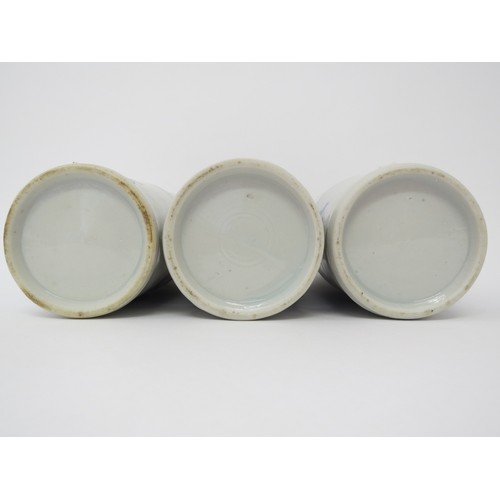 6027A - Three Japanese porcelain brush water pots of bamboo design, 19.5cm tall