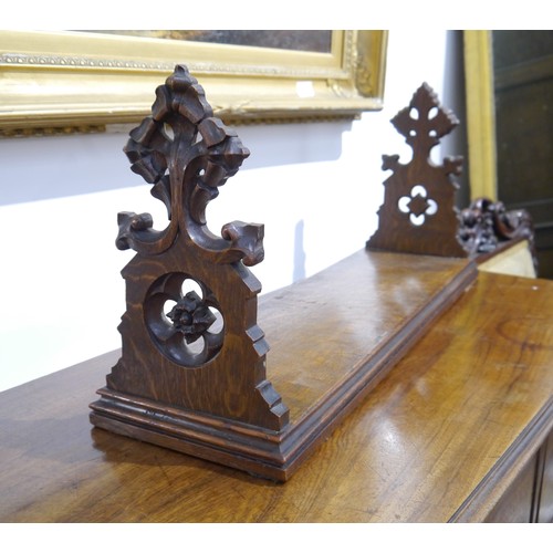 6042A - A Gothic oak bookstand, 31cm x 69cm