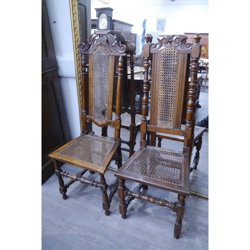 6061 - Two walnut Charles II style hall chairs, cane-backed and seats