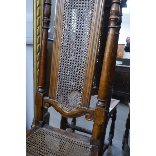 6061 - Two walnut Charles II style hall chairs, cane-backed and seats