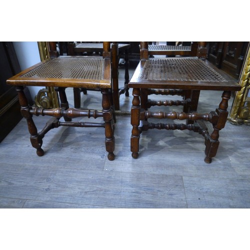 6061 - Two walnut Charles II style hall chairs, cane-backed and seats