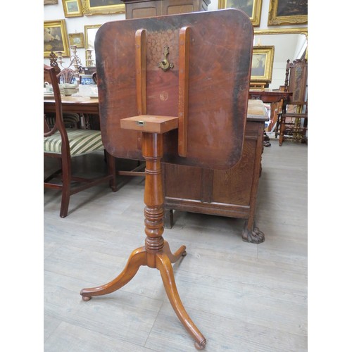 6086 - A 19th Century mahogany tripod table with turned column rectangular top, 47.5cm tall, 55.5cm x 48cm