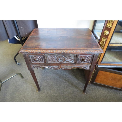 1328 - A George Ill oak two drawer side table on pad feet with later carving, 72cm tall x 71cm wide x 49cm ... 