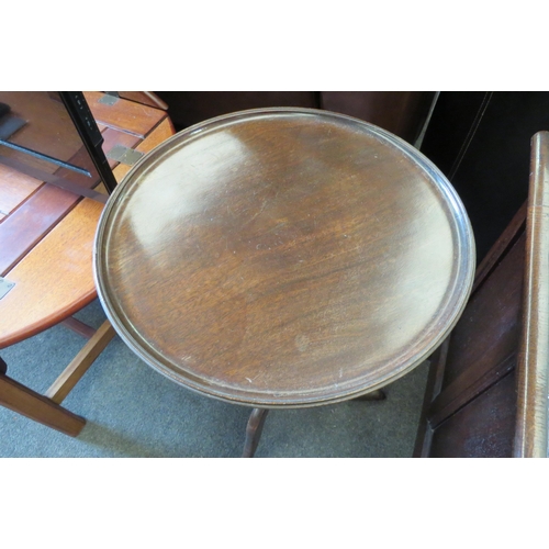 1320 - A 19th Century mahogany wine table with tripod base, 70cm tall x 39cm diameter