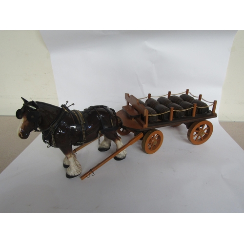 5121 - A wooden model four wheel beer cart with barrels and ceramic horse