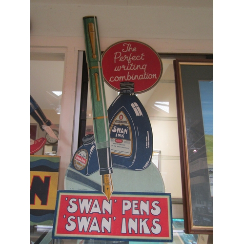 5530 - An easel backed advertising show card 'Swan Pens' depicting pen and ink, 74cm tall