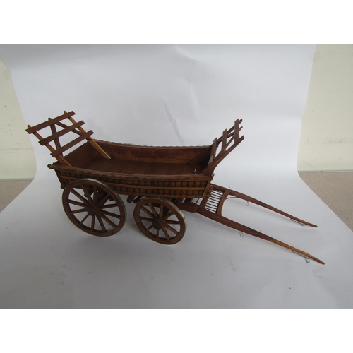 5015 - A wooden model four wheel hay cart