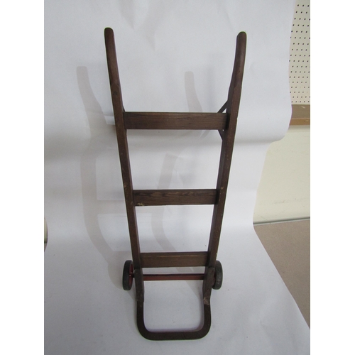 5064 - A childs pine and metal sack trolley