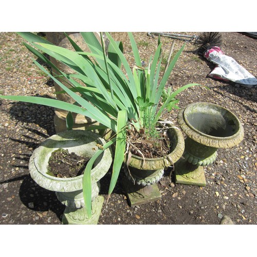 3627 - Three stone effect urns, fluted detail