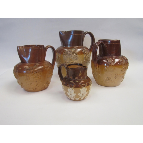 1200 - Four harvest jugs 21cm, 18cm, 17cm and 11cm tall