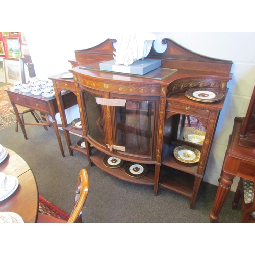 1217 - A late Victorian/Edwardian Sheraton style rosewood bow fronted credenza with central glazed mirrored... 