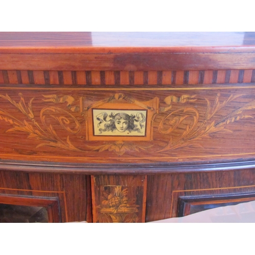 1217 - A late Victorian/Edwardian Sheraton style rosewood bow fronted credenza with central glazed mirrored... 