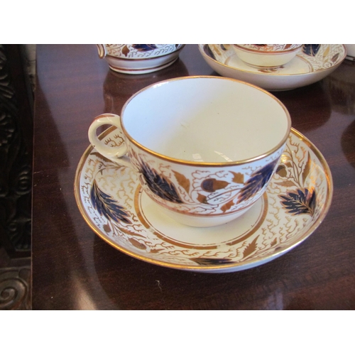 1220 - An early 19th Century English porcelain tea and coffee set, white ground with cobalt and gilt floral... 