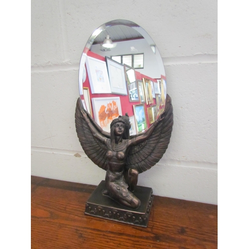 1227 - An Egyptian Goddess bronze effect mirror, 40cm tall