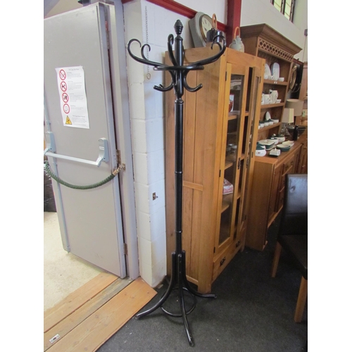 1288 - A stained bentwood coat stand, 190cm tall