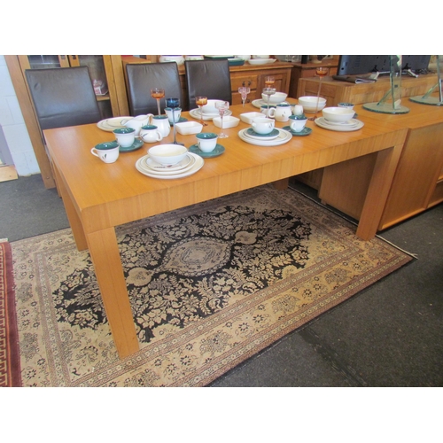 1289 - An oak veneer dining table with two additional leaves, 73cm tall x 170cm long x 95cm wide not includ... 