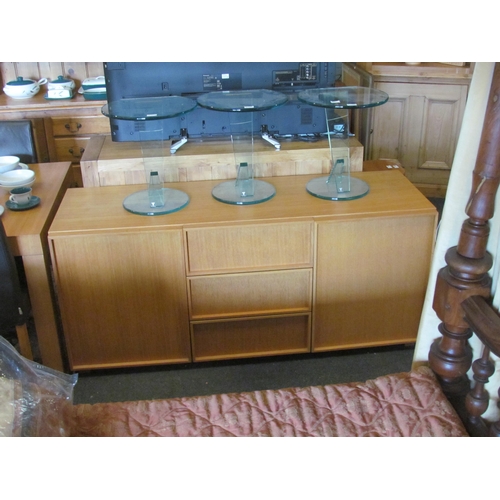 1296 - An oak veneer sideboard with three central drawers flanked by two cupboards, 73cm tall x 165cm wide ... 