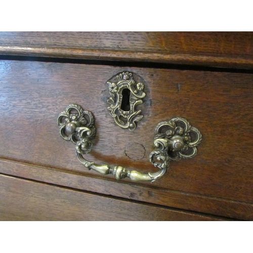 1298 - A 19th Century oak two over three graduating chest of drawers on bracket feet, 95cm tall x 98cm wide... 