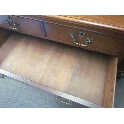 1298 - A 19th Century oak two over three graduating chest of drawers on bracket feet, 95cm tall x 98cm wide... 